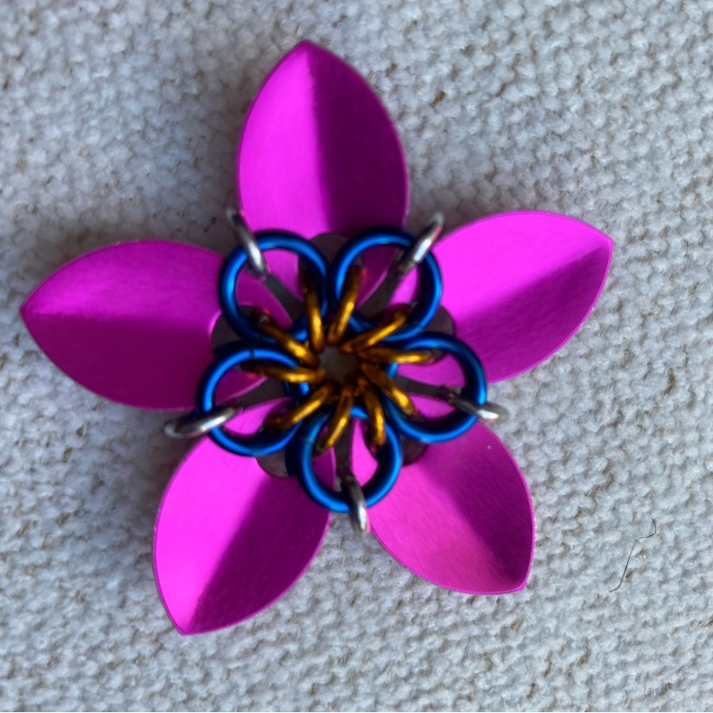 Pink and Blue Artisan Flower Pendant. Woman owned business